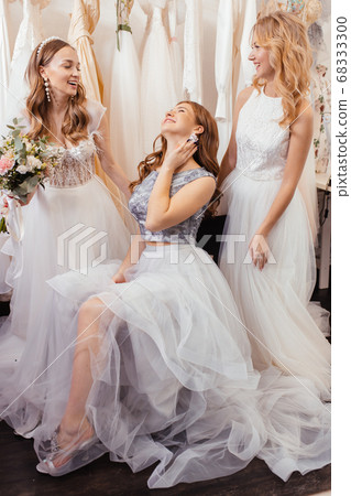 good-looking three women together in wedding dresses good-looking three women together in wedding dresses 68333300