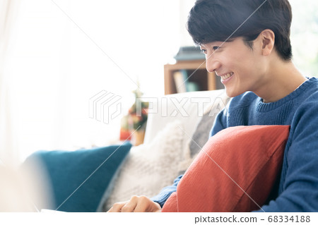 A young man making a video call [Christmas] 68334188