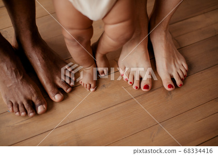 multiracial family stands near each other 68334416