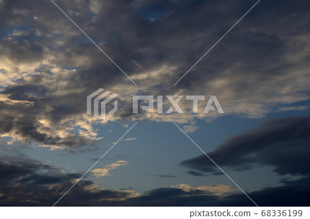 Clouds at sunset. 68336199