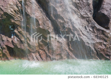 landscape of beautiful Artificial waterfall in garden at the public park 68340125