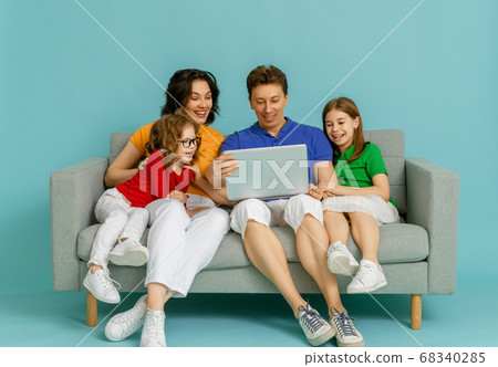 Happy loving family on bright color background. Happy loving family on bright color background. 68340285