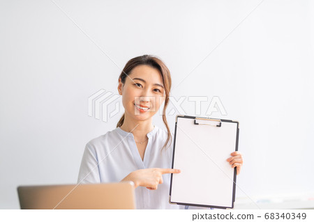 Business Woman Proposing Young Business Woman, Business, Binder, Work, Working, Oh 68340349
