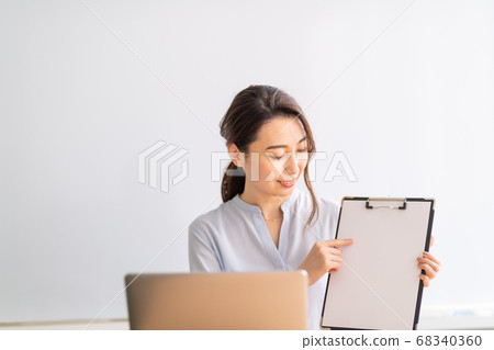 Business Woman Proposing Young Business Woman, Business, Binder, Work, Working, Oh 68340360