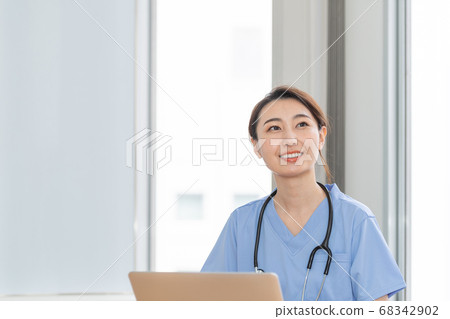 Female medical practitioner, female doctor Female medical practitioner, female doctor 68342902