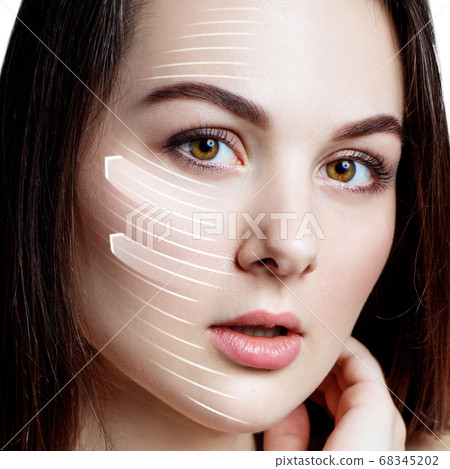 Woman brunette graphic lines shows facial lifting effect. Woman brunette graphic lines shows facial lifting effect. 68345202