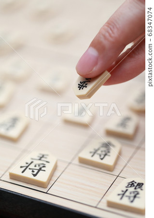 Women's fingers playing shogi Women's fingers playing shogi 68347074