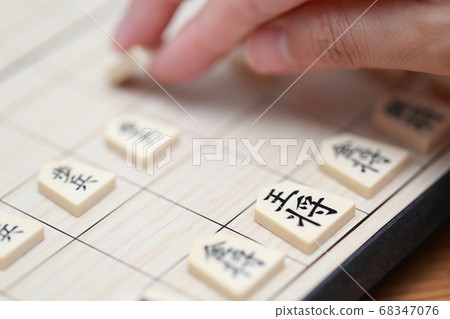 Women's fingers playing shogi Women's fingers playing shogi 68347076