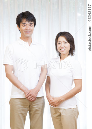 A smiling caregiver A smiling caregiver 68348117
