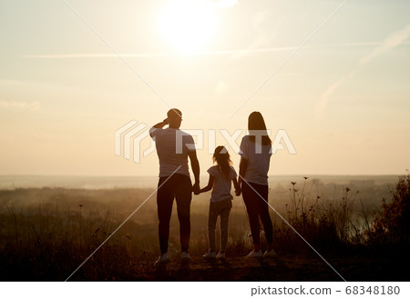 Active family spending time outside the city Active family spending time outside the city 68348180
