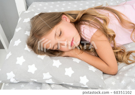 Sweet dreams. Girl child long hair fall asleep 68351102