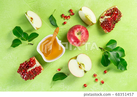 Rosh hashanah concept - honey, apples, pomegranate, symbols Rosh hashanah concept - honey, apples, pomegranate, symbols 68351457