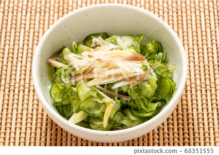 Vinegar with ginger and cucumber. 68351555