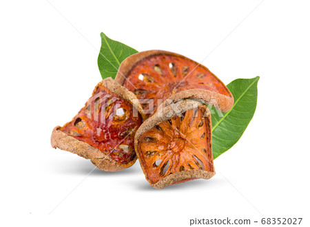 dried quince slices on a white background 68352027