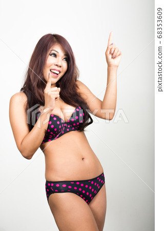 Portrait of young Asian woman wearing lingerie Portrait of young Asian woman wearing lingerie 68353609