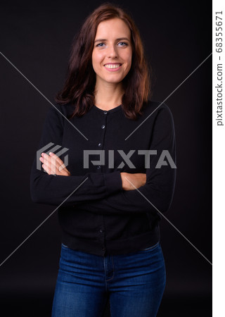 Portrait of happy young beautiful woman with brown hair Portrait of happy young beautiful woman with brown hair 68355671
