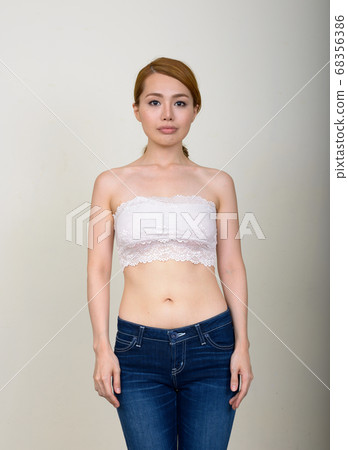 Portrait of young beautiful Asian woman in underwear as health concept Portrait of young beautiful Asian woman in underwear as health concept 68356386