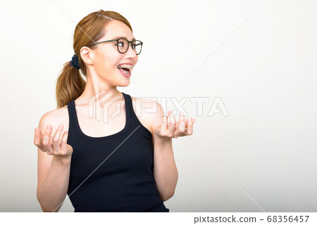 Portrait of happy young beautiful Asian woman Portrait of happy young beautiful Asian woman 68356457