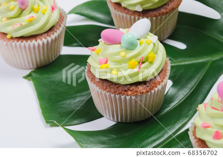 Easter pistachio cupcake with decorations Easter pistachio cupcake with decorations 68356702