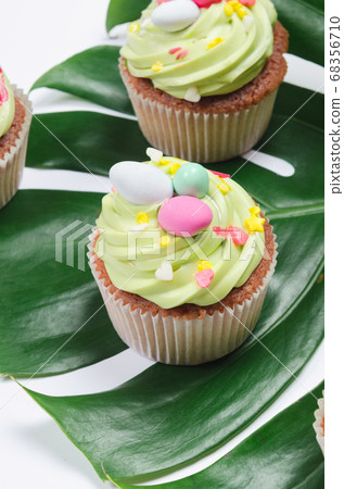 Easter pistachio cupcake with decorations 68356710