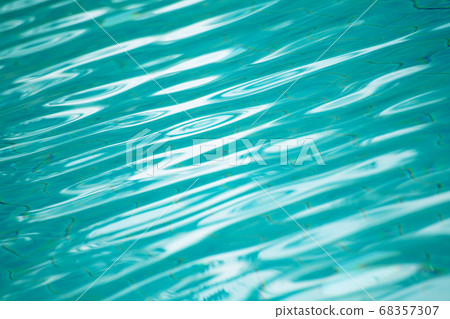 Hotel swimming pool with sunny reflections Hotel swimming pool with sunny reflections 68357307