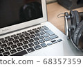 Telework laptop and headphones 2 68357359
