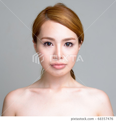 Portrait of young beautiful Asian woman shirtless 68357476