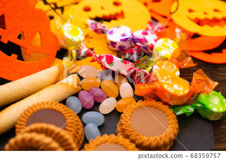 Halloween pumpkin ghost and sweet candy 68359757