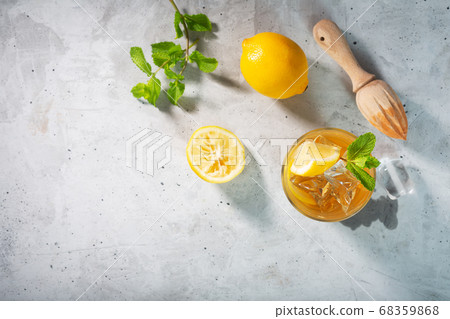 Lemon ice tea on concrete gray background with Lemon ice tea on concrete gray background with 68359868