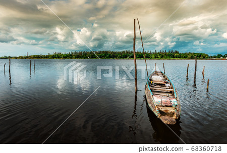 Fishing boat with view of landscape nature in sky Fishing boat with view of landscape nature in sky 68360718