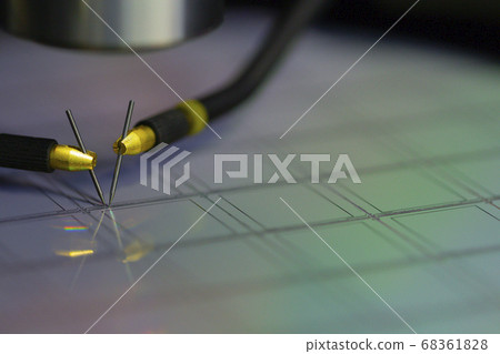 Manual probe system with needles for test of semiconductor on silicon wafer. Selective focus. Manual probe system with needles for test of semiconductor on silicon wafer. Selective focus. 68361828