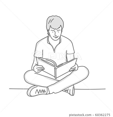 Guy sits in lotus position and reads Guy sits in lotus position and reads 68362275
