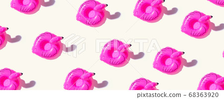 Summer concept with pink flamingo floats Summer concept with pink flamingo floats 68363920