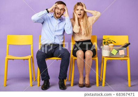 excited and shocked young man and woman received unbelievable news excited and shocked young man and woman received unbelievable news 68367471