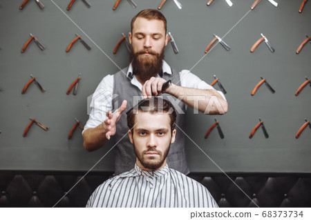 Young Man in Barbershop Hair Care Service Concept 68373734
