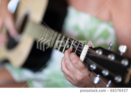 Woman Playing Guitar Abstract Woman Playing Guitar Abstract 68376437