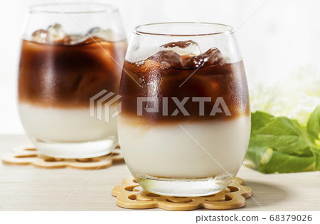Two-tone ice coffee with two layers of coffee and milk 68379026