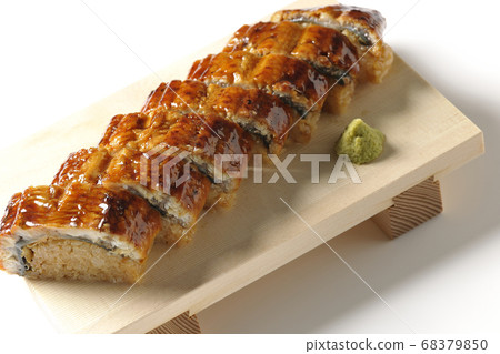 Unagi sushi and wasabi served on sushi geta (white background) 68379850