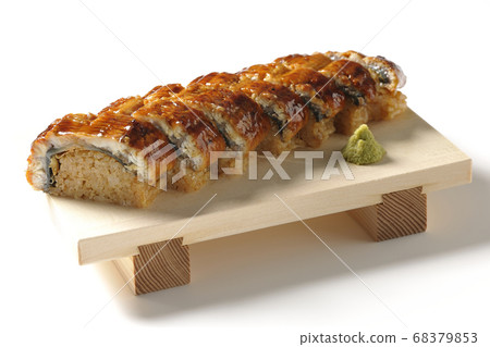 Unagi sushi and wasabi served on sushi geta (white background) 68379853