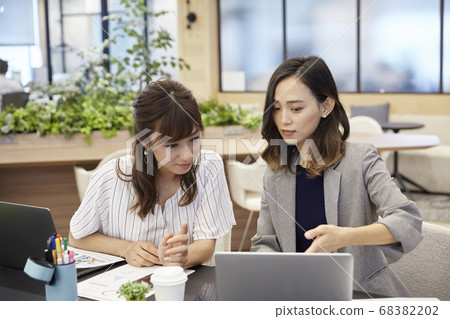 Woman working in casual office 68382202