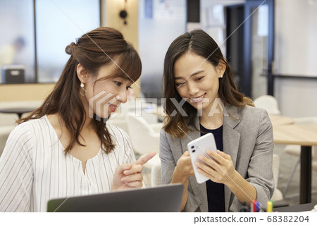 Woman working in casual office 68382204
