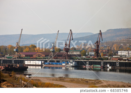 View of the "Central" cargo area of the river port "Osetrovo" in Ust-Kut 68385746