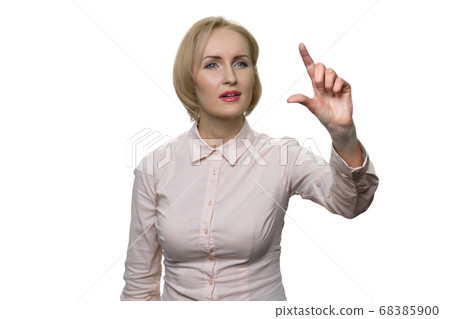 Portrait of businesswoman is zooming virtual screen. 68385900