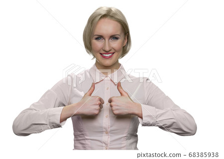 Happy cheerful mature lady is showing thumbs up. 68385938