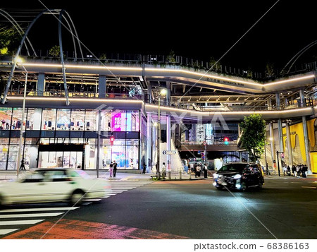 Cars passing in front of Miyashita Park Cars passing in front of Miyashita Park 68386163