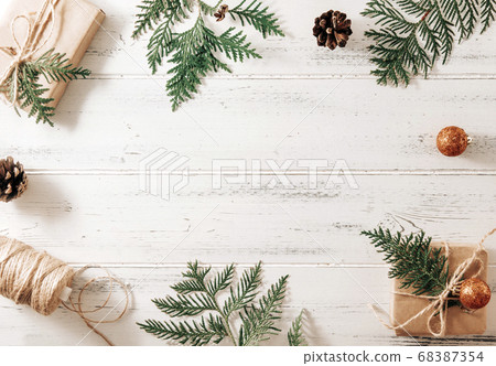 gift box, green branches of thuja, fir branches, 68387354