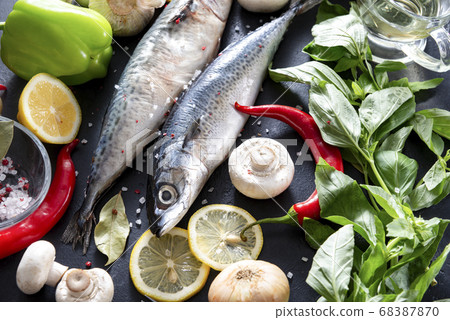 raw mackerel fish with lemon slices, Basil, chili 68387870