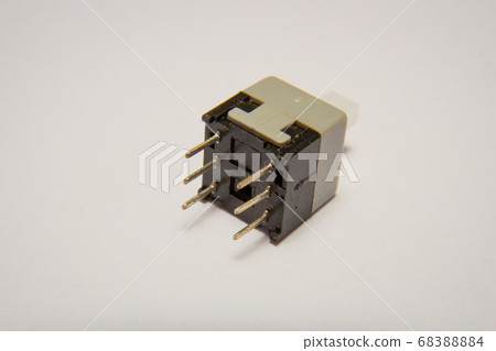 Bottom view of a push button, commonly used with arduino 68388884