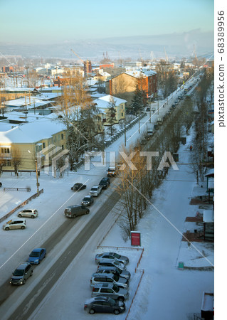 Automobile traffic jam in the Siberian city in  winter. 68389956