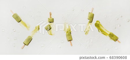 Flat-lay of melting green matcha coconut 68390608